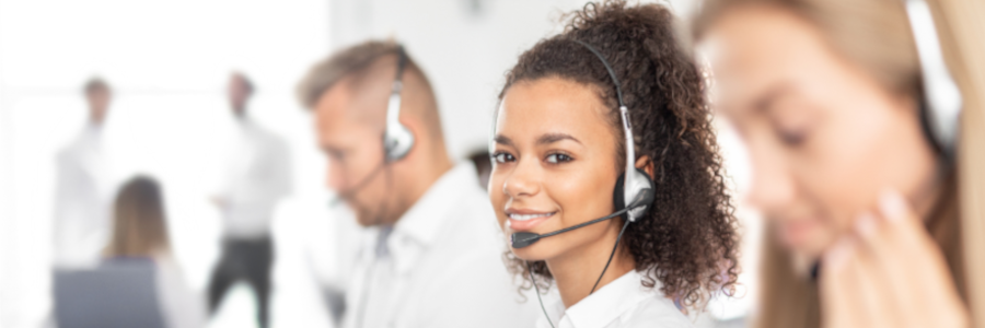 Support representative wearing a headset ready to answer questions about annuities, structured settlements, and payment options.