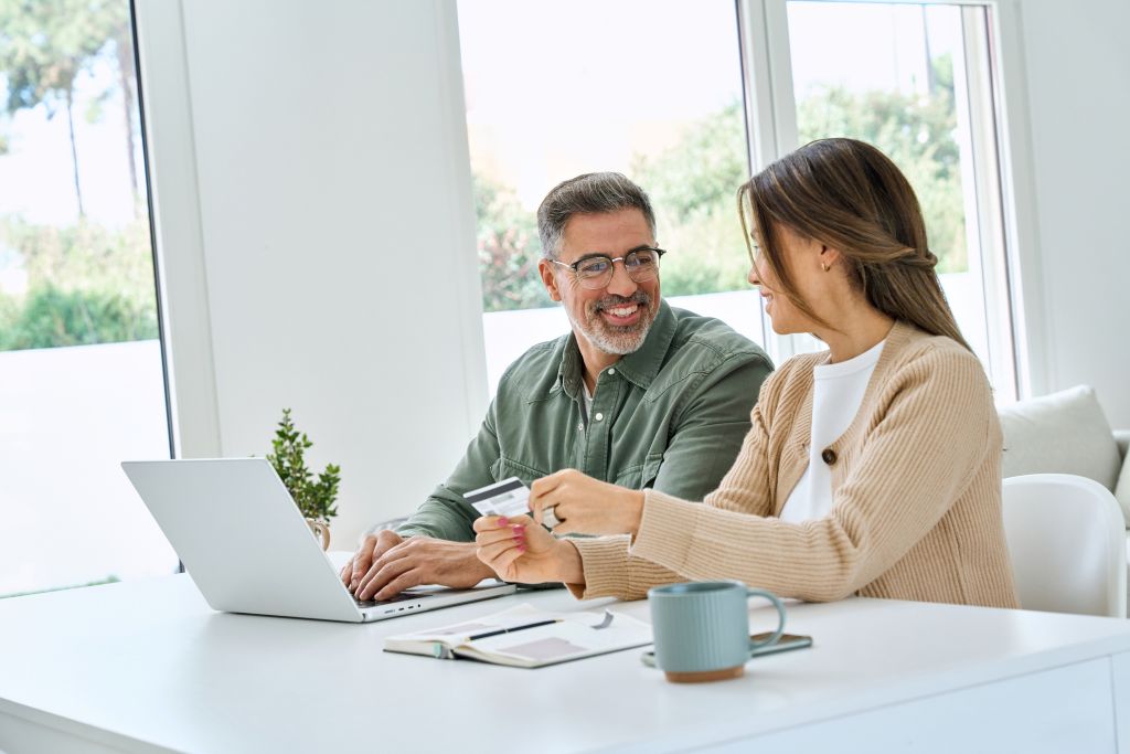 Couple reviewing their finances together at home