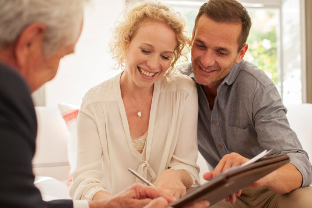 Couple reviewing different types of annuities with a financial professional.